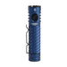 The blue, textured Acebeam EC20 flashlight features a side clip and power button, ideal for outdoor adventures. This EDC flashlight delivers 2800 lumens to illuminate your path.