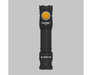 Front view of a black Armytek Partner C2 Magnet USB - Warm flashlight with an orange power button, set against a gray background.