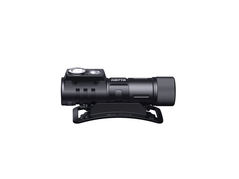 The Fenix HM71R is a high-performance black flashlight with a cylindrical body and dual light elements on its head, mounted on a base, emitting an impressive 2700 lumens, shown against a black background.