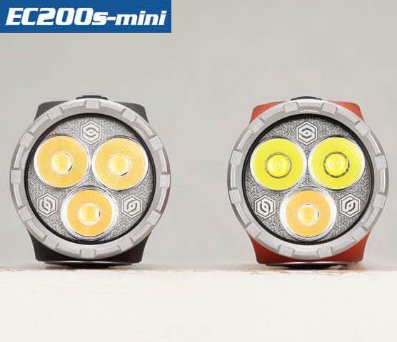 Two compact EDC flashlights labeled "Skilhunt EC200S-Mini" are displayed side by side. The flashlight on the left is grey, and the one on the right is red, each featuring three small LED bulbs and a convenient USB-C charging port.