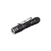 A black tactical EDC LED flashlight with a textured grip, clip, and labeled "Weltool T1 Pro V2" lies on a white background. Perfect for emergency preparedness, it runs on a 14500 lithium-ion battery.