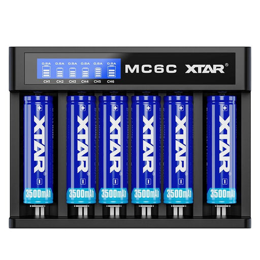 XTAR MC6C battery charger featuring real-time charging monitoring, complete with six slots each containing a blue rechargeable "XTAR 3500mAh" Li-ion battery.